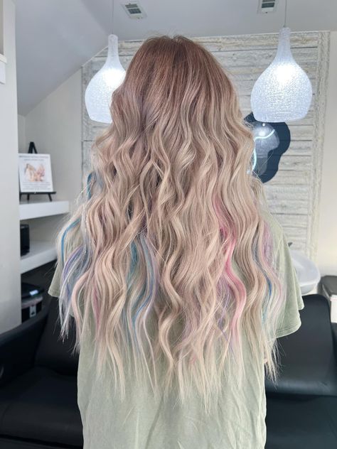 Hair Extensions With Tinsel, Blonde Colorful Hair Ideas, Balayage, Peekaboo Mermaid Highlights, Blonde With Blue And Pink Highlights, Blonde And Purple Hair Aesthetic, Blonde Hair With Pastel Peekaboos, Icy Blonde And Purple Hair, Pastel Pink And Purple Hair Highlights