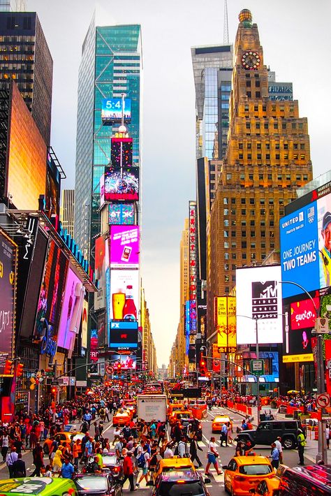 Times Square is a major commercial intersection, tourist destination, entertainment center and neighborhood in the Midtown Manhattan section of New York City at the junction of Broadway and Seventh Avenue. It stretches from West 42nd to West 47th Streets. #timesquare #newyorkcity #newyorkattractions Westin Times Square New York, Iconic New York Pictures, Timesquare New York City, Hilton Times Square, Ny Times Square, New York Culture, Manhattan Aesthetic, Nex York, New York City Times Square