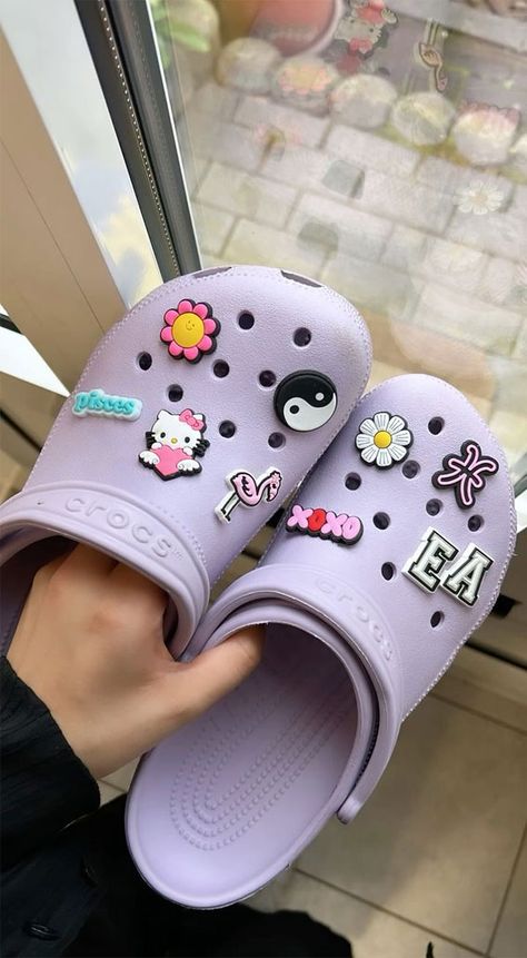 summer crocs, crocs shoes, crocs aesthetic, summer slipper, summer shoes, croc jibbitz,croc jibbitz charm, crocs charm, crocs outfit, summer aesthetic,  summer aesthetic pictures, aesthetic summer vibes, summer vibes Lavender Crocs Aesthetic, Crocs Purple Aesthetic, Lilac Crocs With Charms, Lavender Crocs With Jibbitz, Aesthetic Croc Jibbitz, Purple Crocs Aesthetic, Croks Slipper Aesthetic, Croc Jibbitz Ideas Aesthetic, Purple Crocs With Jibbitz