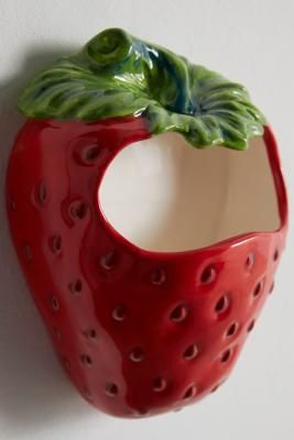 Add a sweet touch to your space with this pocket-style stoneware vase. A strawberry design Ft. a cutout top to store all your most loved belongings. **Content + Care** \- Stoneware \- Wipe clean **Size** \- L: 15cm x W: 9.9cm x H: 20.1cm | Urban Outfitters Strawberry Wall Pocket Vase - Red Strawberry Bedroom Decor, Cherry Themed Bathroom, Strawberry Silhouette, Strawberry Room Decor, Strawberry Bathroom, Fruit Bathroom, Strawberry Room, Entryway Essentials, Strawberry Kitchen Decor