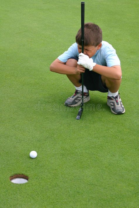 Boy Eyeballs Gimme Golf Putt. Young boy studies an easy gimme putt on a golf gre #Sponsored , #AFFILIATE, #Affiliate, #Golf, #Gimme, #Boy, #Putt Golf Putt, Putt Putt Golf, Golf Green, Flyer Ideas, Putt Putt, Future Kids, Business Flyer, Baseball Field, Creative Business