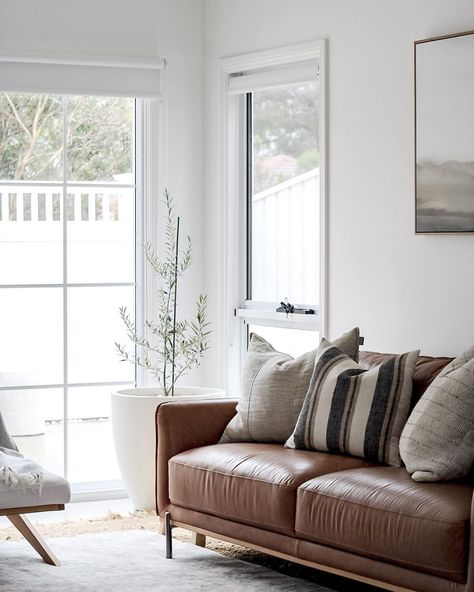 We're all about embracing the beauty in minimalism and celebrating the quiet luxury of neutrals where every detail tells a story of refined elegance and tranquility. Pictured is our Shannon lounge in 100% vintage leather in Tan in the exquisite home of @life.instill_ #nickscali #furniture #home #decor #interiordesign #interiorinspo #furnituredesign #homedecor #homedesign #interiorstyling #interiorinspiration #designinspiration #sofas #lounges #livingroom #livingroomfurniture Tan Leather Lounge Styling, Perth House, Nick Scali, Sofa Leather, Lounge Style, Lounge Suites, Neutral Interiors, Quiet Luxury, Lounge Area