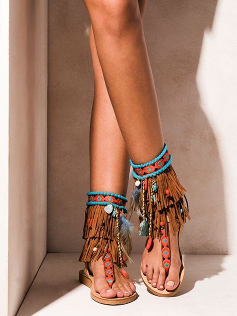 Caribbean sandals with  feathers, suede leather fringes, ethnic cotton trim, turquoise stones, evil eyes, wooden beads, shells and bronze chains. http://www.elinalinardaki.com/shoes/sandals/new-collection/sandal-caribbean/ Diy Boho Sandals, Turkish Sandals, Bohemian Shoes Sandals, Boho Sandals Bohemian, Africa Fashion Woman, Afro Jewelry, Festival Sandals, Hippie Sandals, Bohemian Shoes