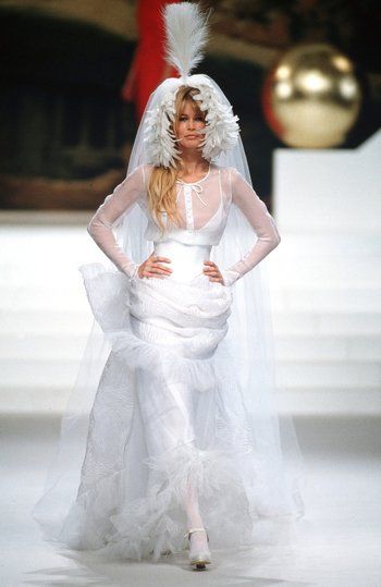 CLAUDIA SCHIFFER wearing the Chanel Bridal Gown at the Spring 1994 Couture Show This look from the Spring 1994 Couture show is the perfect dress option if you’re headlining your Vegas showgirl act right after you elope at a little white chapel. | Karl Lagerfeld's Muses: See Every Model Who's Worn the Iconic Chanel 'Wedding Dress' on the Runway Chanel Wedding Dress, Chanel Wedding, Karl Lagerfeld Chanel, Mode Chanel, Couture Looks, Couture Wedding Gowns, Chanel Couture, Chanel Haute Couture, Couture Mode