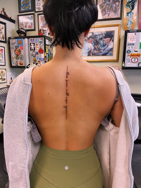 Spine Tattoos For Women Lyrics, Quote Tattoo On Spine, The Sun Will Rise Again Tattoo Spine, Written Back Tattoos, The Sun Will Rise Tomorrow Tattoo, Medium Spine Tattoos For Women, Tattoo Ideas Female Meaningful Spine, Little Sayings Tattoos, Spine Tattoo Cursive