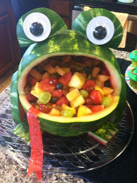 Frog theme baby shower!!! Frog Fruit Bowl, Crazy Frog Birthday Party, Frog Watermelon Carving, Froggy Birthday Party Ideas, Pond Party Ideas, Pond Themed Birthday Party, Frog Theme Birthday Party, Frog Decorations Party, Pond Birthday Party