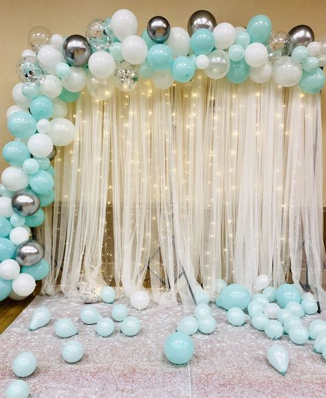 Beautiful elegant teal, white, silver balloon backdrop. Tiffany Blue Sweet Sixteen Backdrop with lights. Sweet 16 Teal And Silver, Turquoise Sweet 16 Decorations, Teal And White Birthday Decorations, Aqua Sweet 16 Decorations, Color Schemes For Sweet 16, Teal White And Silver Party Decorations, Tiffany Blue Balloons, Blue And White Theme Party Decoration, Backdrop With Lights And Balloons