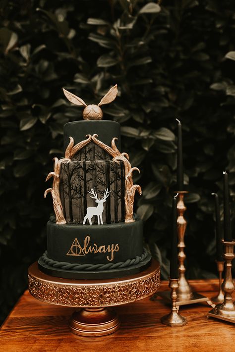 Floating candles, cloaks, & a patronus cake at this mystical Harry Potter-inspired wedding inspiration | Offbeat Bride Tort Harry Potter, Harry Potter Torte, Harry Potter Wedding Cakes, Gateau Harry Potter, Bolo Harry Potter, Cumpleaños Harry Potter, Harry Potter Birthday Cake, Harry Potter Wedding Theme, Tapeta Harry Potter