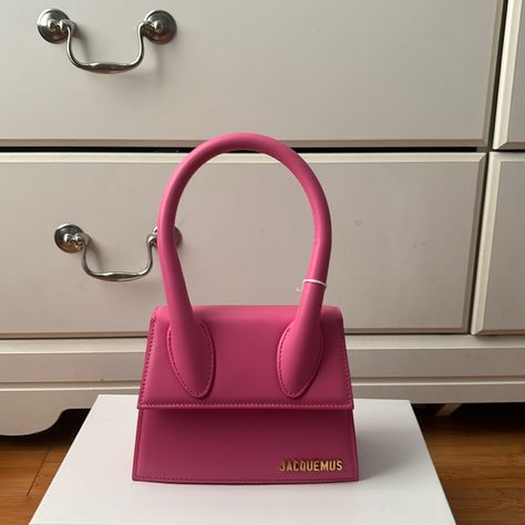 Jacquemus Punk Le Classiques ‘Le Chiquito Moen’ Bag Color: Pink Material: Leather Rolled Carry Handle Adjustable And Detachable Crossbody Strap Logo Hardware Magnetic Press-Stud Flap Size: H 5.25” X W 7” X D 3.5” Brand New With Tags. Never Worn. No Dust Bag. It Came Without It From Ssense. Bags Jacquemus, Jacquemus Bags, Jacquemus Bag, Leather Roll, Press Studs, Crossbody Strap, Color Pink, Dust Bag, Bag Lady