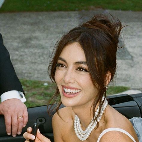 Francesca Hung on Instagram: "Still on cloud nine ☁️" Bridal Bun Messy, Bride Hair Chignon, Wedding Hairstyles Unique, Updo Makeup Looks, Philippine Hairstyle, Top Bun Bridesmaid Hair, Whispy Wedding Hair, High Pony Bun Hairstyles, Italian Wedding Hairstyles The Bride