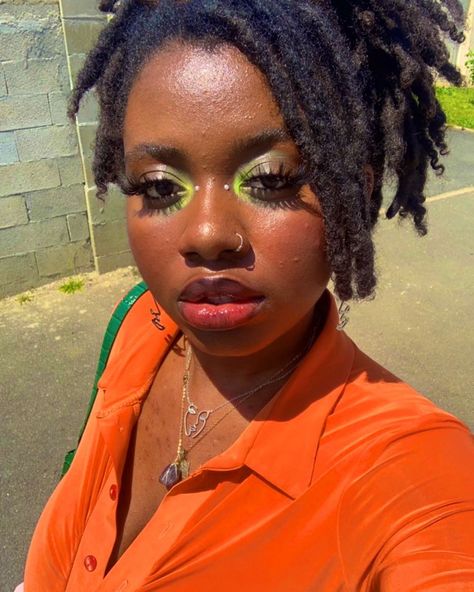 Makeup 
Locs
Green Green Highlight Makeup, Y2k Makeup Green, Green Makeup On Black Women, Green Eyeliner Black Women, Fun Hooded Eye Makeup, Neon Green Makeup Looks Black Women, Trendy Eye Makeup 2023, Green Eyebrows Make Up, Green Eyeshadow Black Women