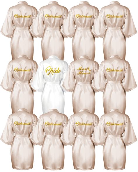 PRICES MAY VARY. Complete Set: our 12 pieces robe set includes 1 white bridal robe, 1 chief bridesmaid robe, and 10 bridesmaids robes; Nice for any wedding party Elegant Design: our robes feature a beautiful kimono style design with a low neckline and belt, and are adorned with eye catching gold glitter; Plus, the words "Bride," "Maid of Honor," and "Bridesmaid" are printed on the back Comfortable Material: made from lightweight, breathable polyester, our robes are soft to the touch and won't wr Gold Bridesmaid Robes, Gold Theme Wedding, Maid Of Honor And Bridesmaid, 10 Bridesmaids, Bachelorette Robes, White Bridal Robe, Bridesmaids Robes, Beautiful Kimono, Bridal Bachelorette Party