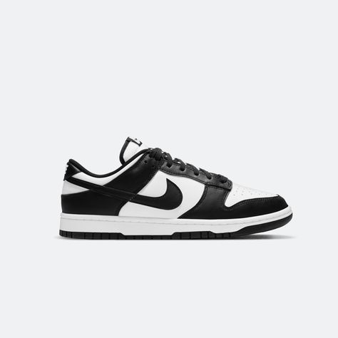 The upper Nike Dunk Low Retro White Black is constructed of white leather with black leather overlays and Swooshes Carolina Do Norte, Black Shoes Men, Yeezy Sneakers, Logo Nike, Nike Models, Youth Shoes, Sneakers Looks, Baskets Nike, Popular Sneakers