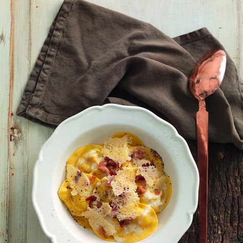 This luscious ravioli recipe breaks one of the so-called carbonara “rules.” Carbonara Ravioli, Ravioli Carbonara, Roman Pasta, Carbonara Ingredients, Make A Sourdough Starter, Smoked Tuna, Yeast Starter, Italian Diet, Ravioli Recipe