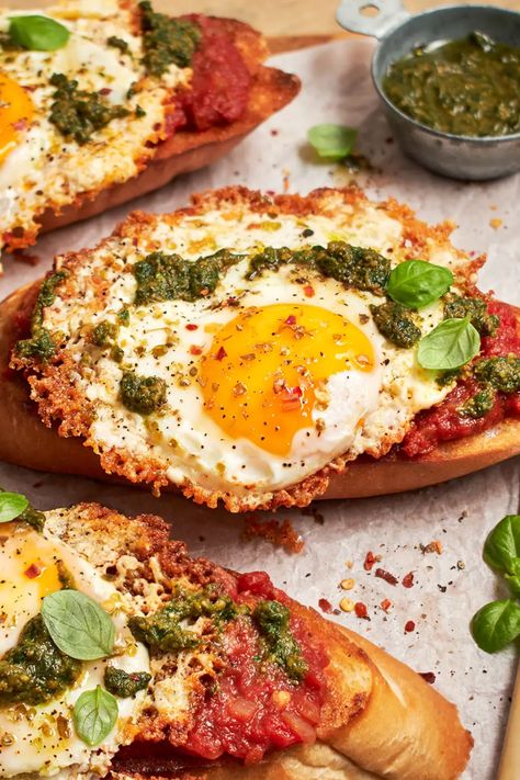 Combining a few favorite brunch dishes to create shakshouka toast with feta fried eggs, drizzled with pesto and red chili flakes. #breakfastideas #easybreakfast #easyrecipe #vegetarianmeals #eggs #toast #sandwichrecipe Healthy Food Prep Ideas, Food Prep Ideas, Healthy Food Prep, Eggs Toast, Red Chili Flakes, Macro Meals, Breakfast Toast, Brunch Dishes, Fried Eggs