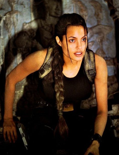 samia-oz:  “ Angelina Jolie  braids history  ” Angelina Jolie Body, Lara Croft Angelina, Lara Croft Angelina Jolie, Tomb Raider Angelina Jolie, Tomb Raider Film, Hunger Games Districts, Laura Croft, Tomb Raider Cosplay, Tomb Raider Lara Croft