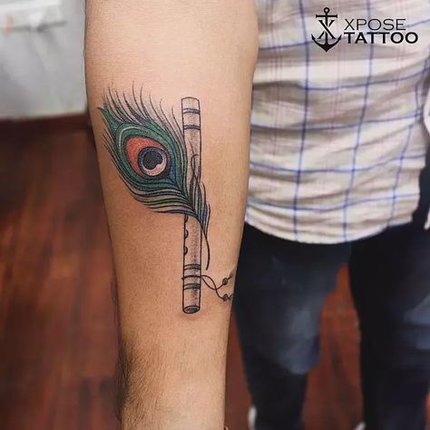 55 Best Forearm Tattoos For Men With Meaning | Fabbon Feather With Flute Tattoo, Peacock Feather With Flute, Peacock Feathers Tattoo, Tattoos For Men With Meaning, Gramophone Tattoo, Inner Forearm Tattoos, Best Forearm Tattoos For Men, Owl Forearm Tattoo, American Flag Forearm Tattoo