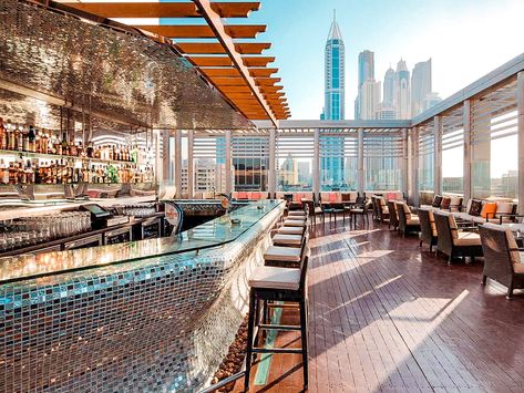 10 Best Rooftop Bars in Dubai in 2022! (With Happy Hour!) Lounge Architecture, Roof Cafe, Rooftop Bar Design, Dubai Restaurant, Hotel Rooftop Bar, Moon Deck, Rooftop Restaurant Design, Outdoor Restaurant Design, Terrace Restaurant