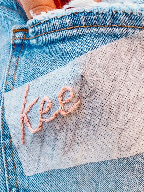 How To Embroider Lettering On Denim By Hand (Without Messing Up) + FREE DOWNLOAD How To Sew Words On Fabric By Hand, Machine Embroidery Denim Jacket, Hand Stitching On Clothes, Hand Embroidery For Clothes, Stitching Words Hand Embroidery, How To Embroider Denim By Hand, How To Stitch Clothes By Hand, How To Embroider Words On Clothes, How To Embroider By Hand On Jeans