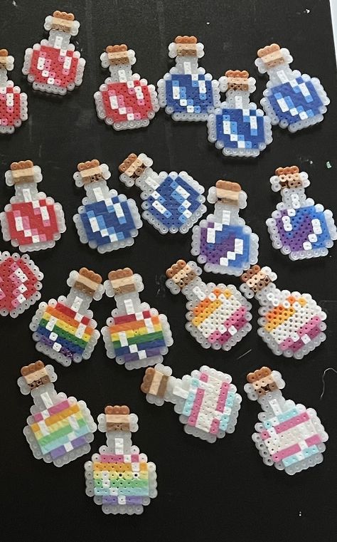 Pill Bottle Perler Beads, Perla Bead Idea, Halloween Candy Perler Beads, Cute Pearled Bead Ideas, Perler Bead Uses, Perler Potion Bottle, How To Melt Perler Beads With An Iron, Perler Beads Potion, Cool Things To Make With Perler Beads