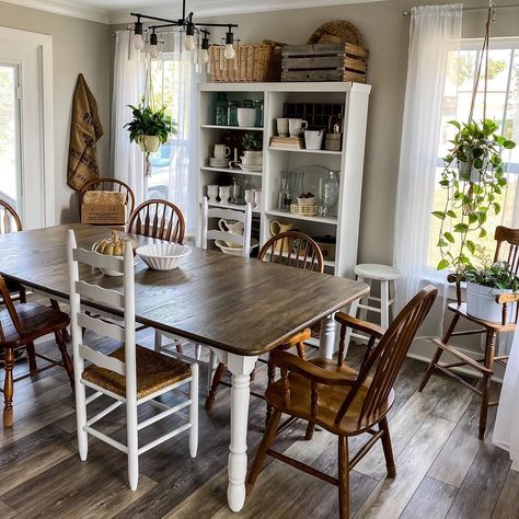 Dark Table With White Chairs, Cozy Aesthetic Dining Room, Mismatched Dining Table And Chairs, Mismatched Kitchen Chairs, Mismatch Chairs Dining Table, Dining Room Mismatched Chairs, Table Mismatched Chairs, Cottage Dining Room Decor, Table With Mismatched Chairs