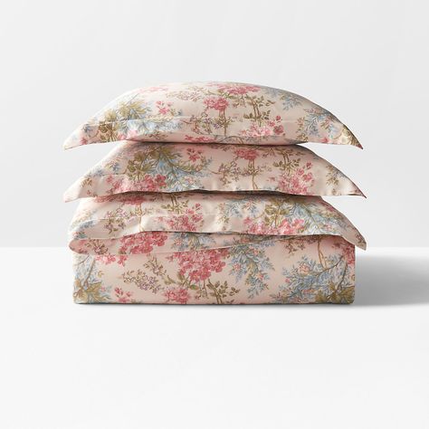 Based on an antique tropical floral print the Sadie comforter showcases blooming vines rendered across smooth cotton sateen. Duvet Cover Vintage, Floral Antique Bedroom, Floral Coastal Bedroom, Cottage Core Duvet Cover, English Garden Bedroom, Pepperdine Dorm, Light Pink And Green Bedroom, Pink Floral Bedding, Cowgirl Bedding