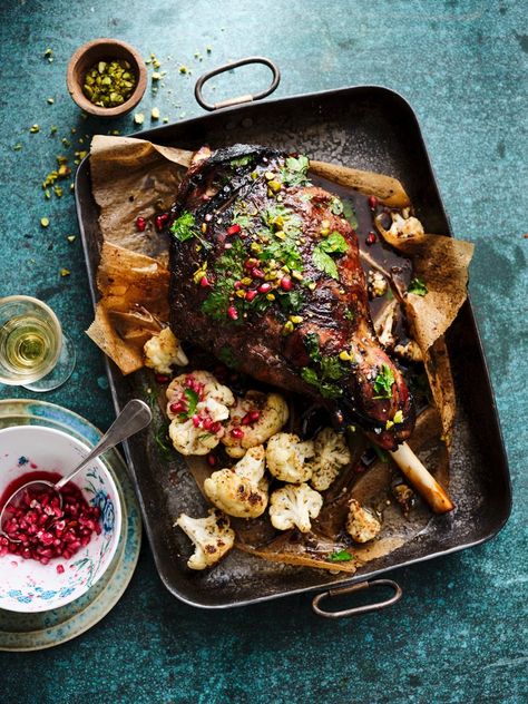 This is a great way of celebrating full-flavoured autumn lamb by roasting it with a few middle ... Holiday Lamb Recipes, Moroccan Lamb Shoulder, Slow Cooked Lamb Recipes, Signature Appliances, Lamb Shoulder Recipes, Shoulder Of Lamb Recipes, Morrocan Lamb, Pomegranate Lamb, Roast Lamb Shoulder