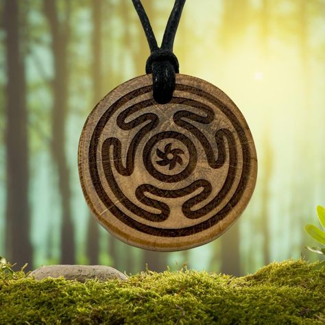 Natural pendant with Wheel of Hecate Symbol. Hand made from wind felled branches from ancient oak trees. The oak has been seasoned for over 2 years before crafting these pendants.  Hecate's Wheel is a symbol commonly used in modern paganism and witchcraft to invoke the magical powers of the goddess Hecate or to ask for her protection and guidance. The symbol itself was created in modern times but is based on ancient descriptions of Hecate. Hand sanded and finished with Parrs natural linseed oil which protects the oak but also brings out the stunning grain. choose from 4 sizes  20mm, 25mm, 30mm, 35mm approximately 5mm thick Hung on natural waxed cotton cord Hecate Symbol, Hecate's Wheel, Goddess Hecate, Oak Branch, Oak Trees, Le Vent, Linseed Oil, Modern Times, The Goddess