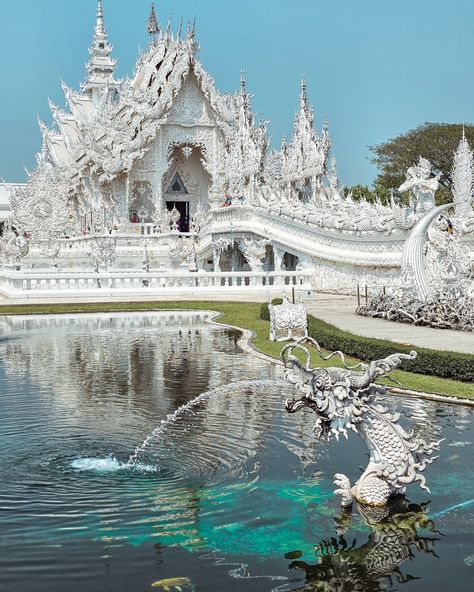 WHITE TEMPLE BEST PHOTO SPOTS White Temple is the main attraction in Chiang Rai and probably in the whole North Thailand, therefore the crowds are inevitable. Most people are trying to get their photo taken at the Bridge of The Cycle of Rebirth (which is pretty cool!), and so they completely ignore other great corners. And the secret is exactly in THOSE CORNERS. They are usually empty, but offer amazing photo opportunities. Plus, you get to enjoy this amazing temple by yourself. Some peo... Chiang Rai, The White Temple Thailand, White Temple Thailand, North Thailand, White Temple, Main Attraction, Amazing Photo, Historical Place, Travel Instagram