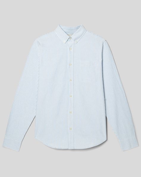 A best seller now in 100% organic cotton. We remixed our fan favorite oxford in a 100% organic cotton fabric and updated the fit so it’s more roomy and relaxed—a classic standard fit. Made to be worn untucked or tucked in. Pair the Classic Oxford Shirt with trousers or denim—brace yourself for compliments. Tops For Men, Selling Clothes, Organic Cotton Fabric, Men's Shirts, Oxford Shirt, Clothing Apparel, Shirt White, Mens Tees, Blue Stripes