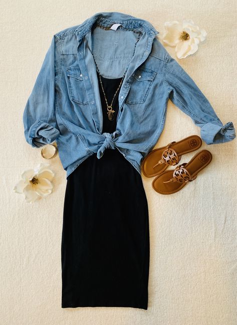 Stylish way to wear a denim shirt with a black casual dress Black Dress Denim Shirt, Black Dress Chambray Shirt Outfit, Black Dress Denim Shirt Outfit, Black Dress With Jean Shirt, Denim Button Shirt Outfit, Sleeveless Chambray Shirt Outfit, Black Dress With Denim Shirt, Ways To Wear A Denim Shirt, Denim Sleeveless Shirt Outfit