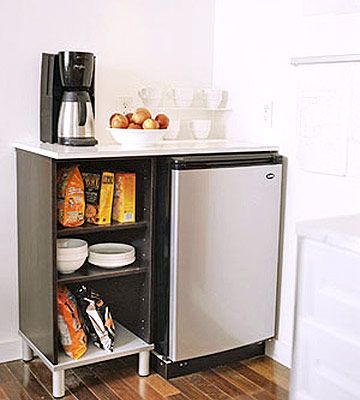Beverage Bar - for Neal's coffee maker Adding a freestanding beverage center allows you to include a small fridge, coffeemaker, and extra storage in the kitchen. Drinks Fridge, Mini Fridge Cabinet, Apartemen Studio, Beverage Bar, Home Coffee Stations, Beverage Center, Small Fridges, Salon Suites, Appliances Storage