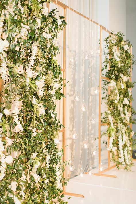 Ashton + Zachary | White, Green & Gold Wedding in Houston, Texas | Photo: The Cotton Collective | Garden chic theme, featuring lush greenery, white flowers, metallic decor and warm lighting | #goldaccents #garden #greenery #wedding #unique #luxury #ethereal #weddingideas Green And White Debut Theme, Good And White Wedding Decor, White Flower Theme Party, Greenery White And Gold Wedding, White Green Decor Wedding, Gold And Greenery Wedding Decor, Green White And Gold Flower Arrangements, Light Green Gold And White Wedding, Classic Greenery Wedding Theme