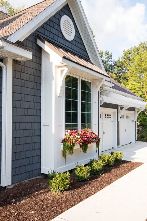 Lake House Exterior - Dark grey charcoal vinyl shake siding with white trim, pergola, window boxes and corbel details. Coastal Farmhouse Exterior, Vinyl Shake Siding, Shake Siding, Lake Houses Exterior, Farmhouse Exterior Design, Small Cottages, Cottage Exterior, Casas Coloniales, Exterior Remodel