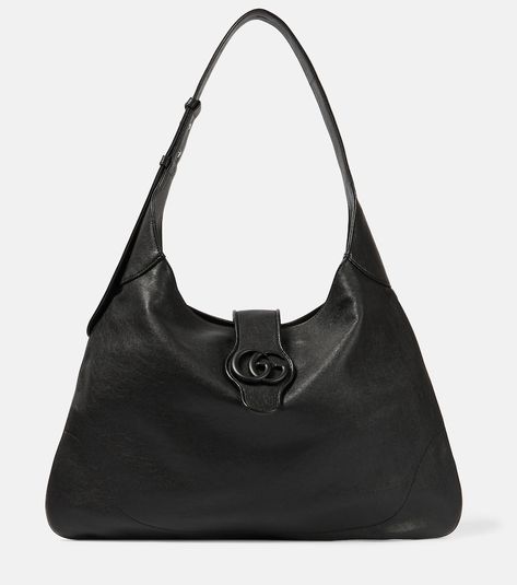 Find Gucci Aphrodite Large Leather Shoulder Bag on Editorialist. Material: lamb leather. Lining: suede. Made in Italy. Designer color name: Black/Black/Black. Adjustable shoulder strap. Closure: magnetic fastening. Internal details: internal zipped pocket. Includes: dust bag. Best Online Stores, Guccio Gucci, Gucci Outfits, Balenciaga Bag, Womens Bags, Gucci Gucci, Rectangular Sunglasses, Gucci Belt, Gucci Accessories