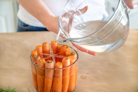 HOW TO CREATE A CUTE EASTER CARROT FLOWER ARRANGEMENT | Everyday Laura Carrot Decorations For Easter, Carrot Flower Arrangement, Bunny Flower Arrangement, Carrot Decor, Creative Dinner, Mason Jar Flower Arrangements, Easter Centerpieces Diy, Easter Bouquet, Easter Floral Arrangement