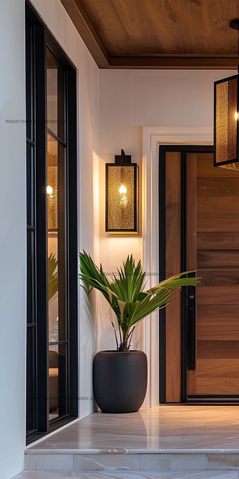 The stylish entrance door features contemporary front doors that add a modern touch. Doors, Front Doors, Entrance, Front Door