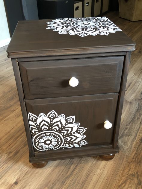 I got this nightstand at Goodwill for $9, it had a medium stain on it. So I sanded it down, stained in chocolate brown and added a little brown paint to calm down the wood grain. Then I painted on this stencil in white. Mandala Nightstand, Dresser Repaint, Dresser Makeover White, Side Tables Ideas, Nightstand Painted, Painted Nightstand, Furniture Makeover Inspiration, Painted Night Stands, Stencil Furniture