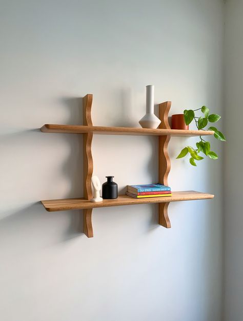 Designed and made in Brooklyn! The Wave wall mounted shelf is shown here in solid red oak with a natural finish. Keyhole brackets are installed in the shelf and can be hung with wall anchors. Made to order with a 2-3 week lead time Contact me for details on custom sizes or other lumber options Diy Wall Shelving, Shelves Living Room, Wall Shelves Living Room, Wall Shelf Unit, Wall Mounted Shelf, Wave Wall, Shelving Design, Living Room Couch, Wood Wall Shelf