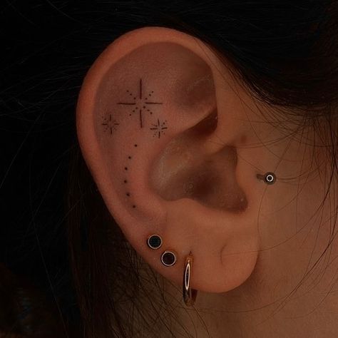 Stars And Dots Tattoo Stars And Dots Tattoo, Cartilage Tattoo, Ear Lobe Tattoo, Roman Numeral Date Tattoo, Dots Tattoo, Inner Ear Tattoo, Hair Braid Styles, Nape Tattoo, Sparkle Tattoo