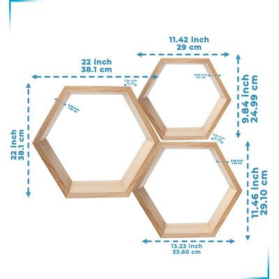 Floating geometric shelves: Display charming showpieces, decorative items, and other prized possessions while offering functional storage with wooden display shelves. Reduce clutter and highlight your rustic décor while keeping everything organized. | Gracie Oaks Tanley 3 Piece Hexagon Solid Wood Floating Shelf Brown 22.0 x 22.0 x 1.5 in | Home Decor | C011085906_417738724 | Wayfair Canada Honeycomb Shelves Decor, Hexagon Shelf Decor, Wooden Display Shelves, Display Shelf Design, Hexagon Decor, Small Flower Gardens, Wood Floating Shelf, Shelves Display, Wood Hexagon