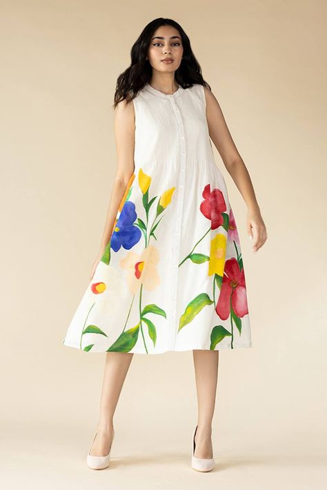 Off White Muslin Hand Painted Floral Dress Inspirations For Women Hand Painted One Piece Dress, Hand Painted Outfits, Motifs For Fabric Painting, Hand Painted Tops For Women, Floral Hand Painted Fabric, Hand Painted Dress Indian, Hand Painted Kurti Designs, Muslin Dress Women, White Dress Painting