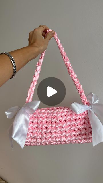 𝓫𝔂𝓰𝓪𝓵𝓴 - crochet patterns for beginners 🎀 on Instagram: "Crocheting with thick satin ribbon yarn to make this gorgeous satin bow handbag inspired by @nina.new.york 🎀 Perfect crochet handbag for a wedding guest 💒 I think I am now addicted to satin ribbon yarn, need to order more! It gives a luxurious touch to your crochet bags #crochet #crochetaddict #crochetersofinstagram #satinbow #crochetbow #bows #ribbons #bowbag #crochethandbag #crochet #slowfashion #slowfashion #knittingbags #knitbag #amigurumi" Crochet Satin Ribbon Bag, Satin Ribbon Crochet Bag, Crochet With Ribbon Yarn, Crochet Ribbon Bag, Crochet Ribbon Yarn, Crochet With Ribbon, Thick Yarn Crochet, Satin Ribbon Crafts, Bow Handbag