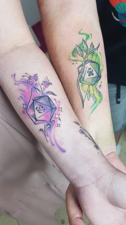 [Art] Me and my GF got D&D inspired tattoos |   4 couple tattoos Dragon Tattoo Couple, Dnd Inspired Tattoos, Dungeon And Dragons Tattoo, D&d Drawings, Couple Tattoos Harry Potter, Matching Video Game Tattoos, Dungeons And Dragons Tattoo Ideas, Sims Tattoo Ideas Real, Dungeons And Dragons Nails