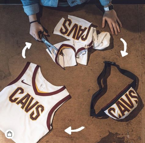 Have you ever wondered what becomes of official NBA jerseys when a player gets traded or decides to “take their talents” elsewhere? Upcycling-savvy business venture, Looptworks, found a more sustainable option that turns your favorite team apparel into one-of-a-kind items that still rep for your favorite franchise.  #gamedayoutfit #nba #cavs #sustainablefashion #sustainable #fashion #portland #pdx #travelportland #ecofriendly #upcycle #sports #diy #jersey Upcycled Sportswear, Upcycle Jersey, Diy Jersey, Pride 2023, Upcycle Clothing, Jersey Fashion, Sports Jerseys, Nba Jerseys, Diy Upcycling