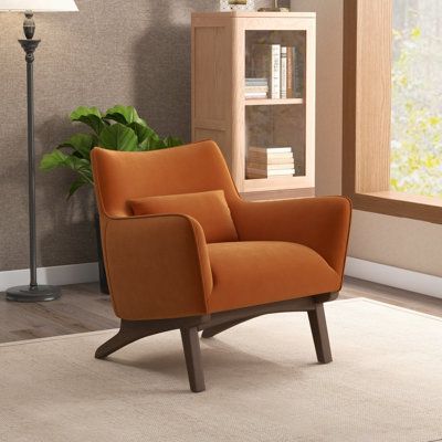 This armchair has a curvaceous shape and mid-century modern styling that makes a statement in your home. It’s crafted with solid wood that sits on V-frame legs with a brown hue. This chair is wrapped in solid-colored upholstery and has high-rounded arms and a tight back. The seat is filled with foam and pocket springs that give you just the right amount of support. The throw pillow (included) adds another layer of comfort and texture. This accent chair has a weight capacity of 350 pounds. Uphols Armchair Bed, Tufted Accent Chair, Upholstered Armchair, Upholstered Accent Chairs, Mid Century Armchair, Reading Chair, Contemporary Chairs, Living Room Furniture Chairs, Luxe Interiors