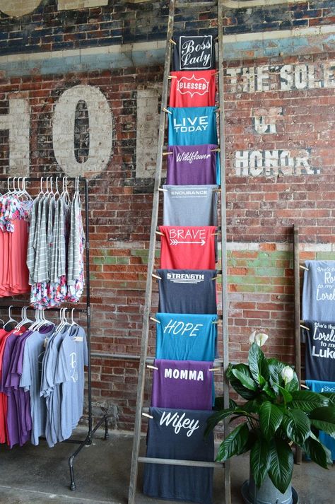 ladder t-shirt displays Clothing Store Displays, Vendor Displays, Shirt Display, Clothing Displays, Boutique Display, Boutique Decor, Craft Show Displays, A Ladder, Retail Store Design