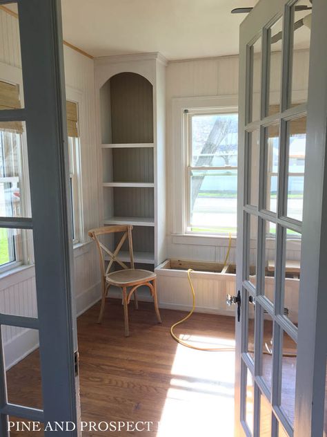 Built In Shelf Around Window, Window Seat With Low Windows, Sunroom With Built In Shelves, Bookcases And Window Seat, Window Seat In Office Built Ins, Bay Window Built In Shelves, Window Seat Sunroom, Built In Bench Window Seat, Bookcases Flanking Window