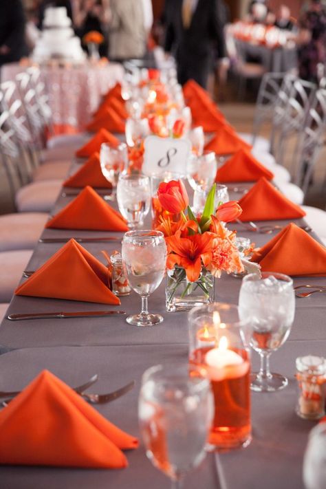 Gray and orange wedding. Simple centerpieces for long feasting tables. Gray And Orange Wedding, Orange Grey Wedding, Orange Wedding Decorations, Orange Wedding Themes, Caribbean Party, Silver Wedding Decorations, Feasting Table, Orange And Silver, Wedding Orange