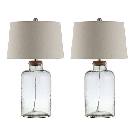 Toss a splash of style into your home with this Safavieh Caden Glass Table Lamp 2-piece Set.Click this HOME DECOR & FURNITURE GUIDE to find the perfect fit and more! Toss a splash of style into your home with this Safavieh Caden Glass Table Lamp 2-piece Set.Click this HOME DECOR & FURNITURE GUIDE to find the perfect fit and more! Clear design Stainless steel finish details ​For indoor useDETAILS 16"H x 16"W x 27.5"D Weight: 8 lbs. Assembly required Glass, cotton Manufacturer's 30-day limited war Beachy House, Clear Table Lamp, Clear Glass Lamps, Glass Table Lamps, Farmhouse Lamps, Handmade Wall Clocks, Clear Table, Table Lamp Shades, Bedside Lighting